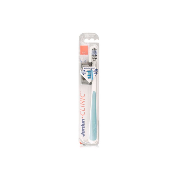 Buy Jordan shiny white medium toothbrush in UAE