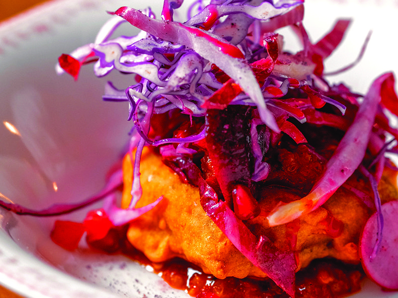 Local ingredients like this cabbage feature heavily on the menu │ Paneer pakora  with cherry salad