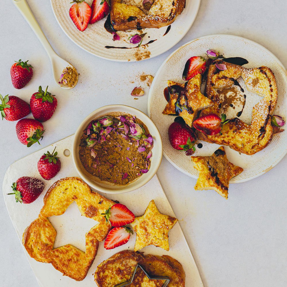 Advieh-spice French toast stars with date syrup