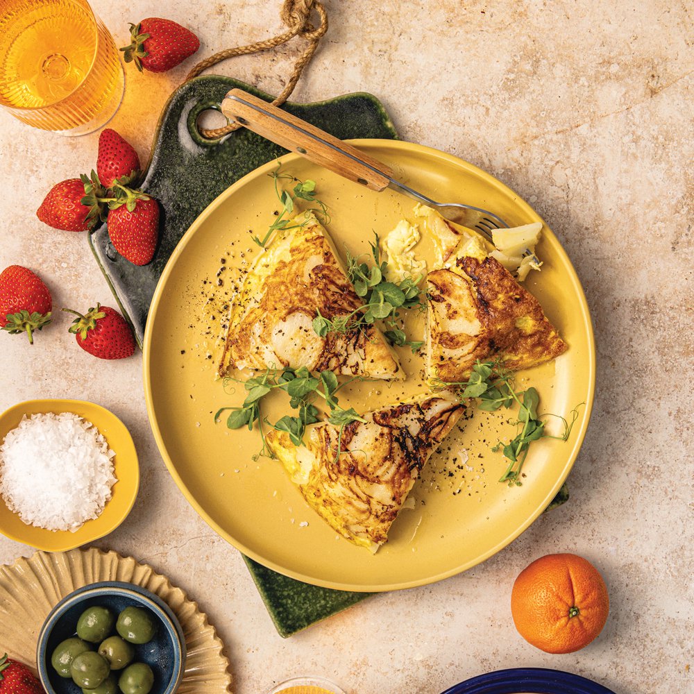 Spanish tortilla with green olives and fruit