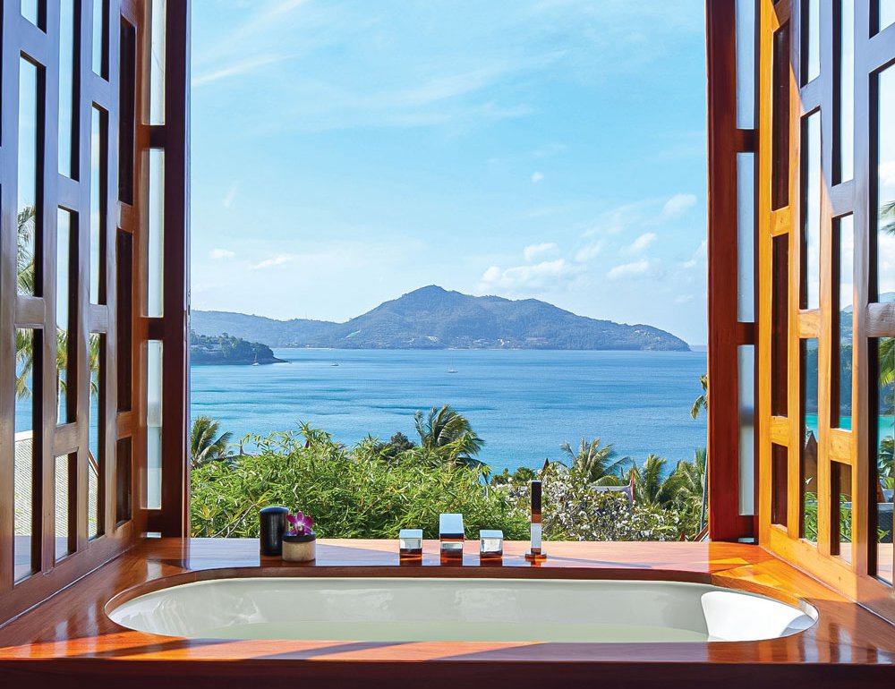 Soak in panoramic views from a luxurious bath
