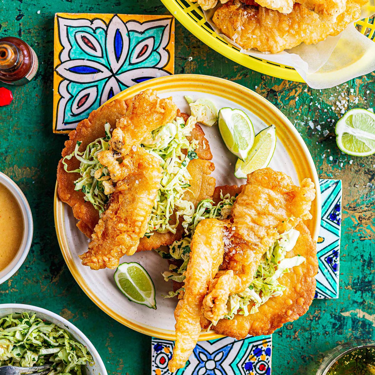 Baja fish tacos with herbed mojo de ajo slaw