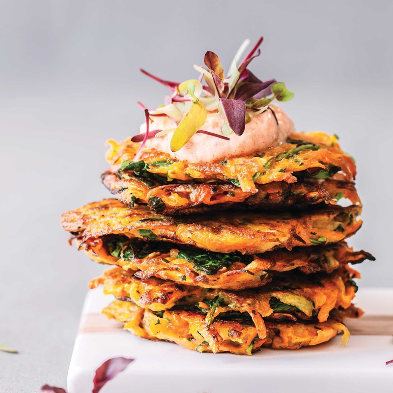 Sweet potato and carrot fritters with harissa yoghurt