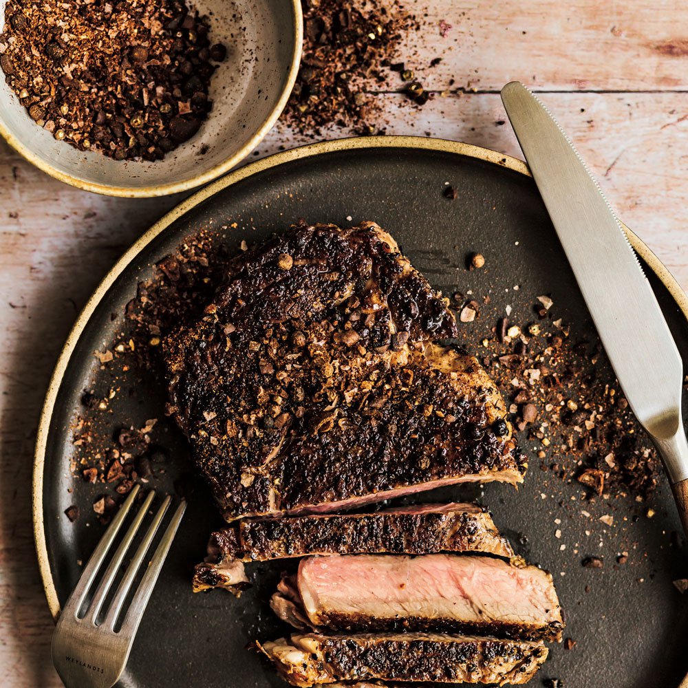 Coffee bean and pepper rubbed rib-eye
