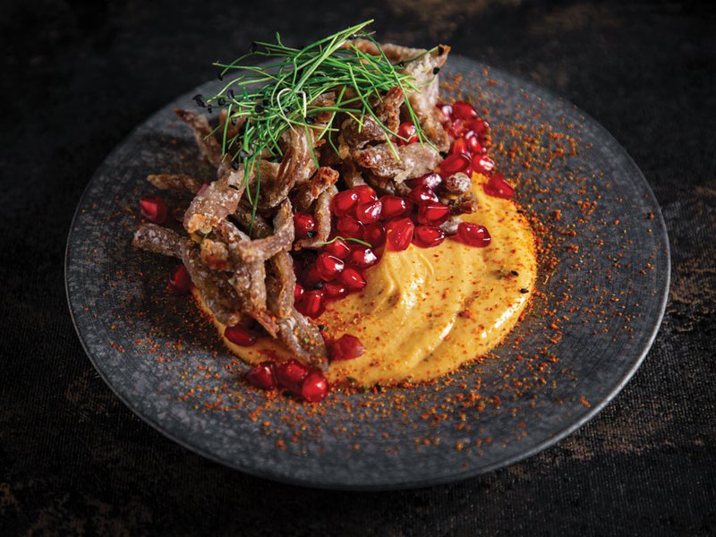 The ‘demon hummus’ – crispy duck atop sweet and spicy red pepper hummus