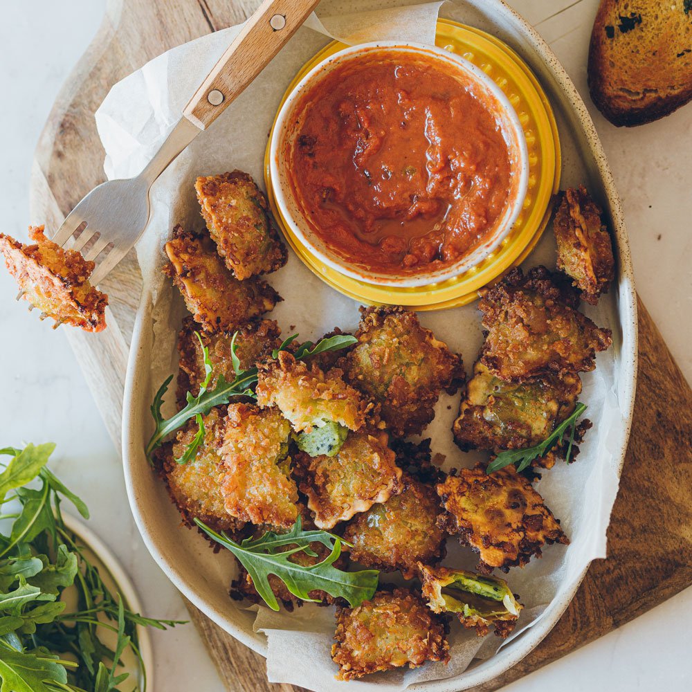 Fried spinach ricotta ravioli with tomato mascarpone dip