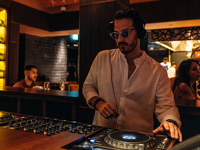 Chez Wam’s music lends a cosy atmosphere to the venue │ The sharing table is tucked away in a semi-private corner