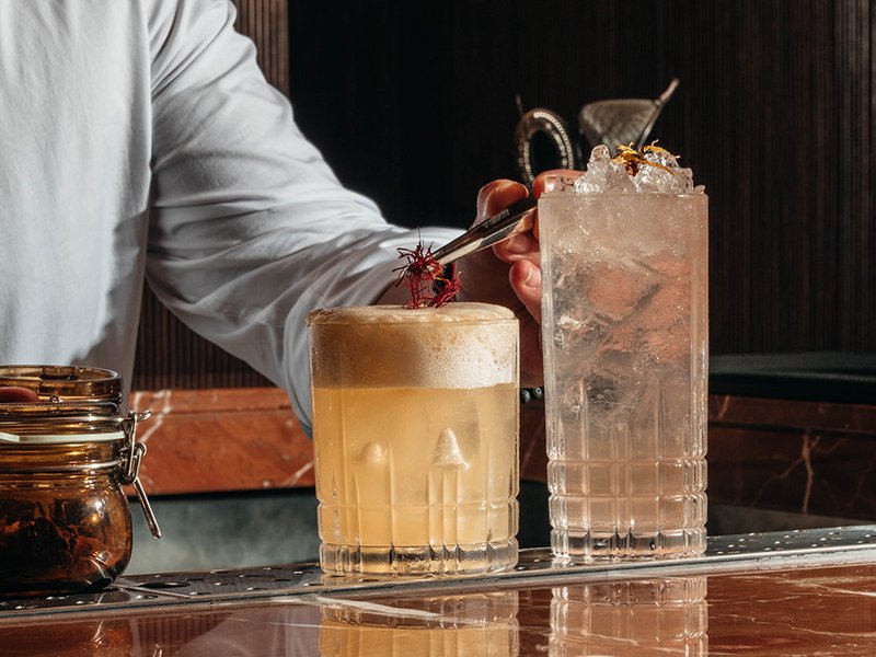 The Hokkaido scallops are flanked by marinated salmon and fried Camembert │ Mixologists whip up creative mocktails at the bar