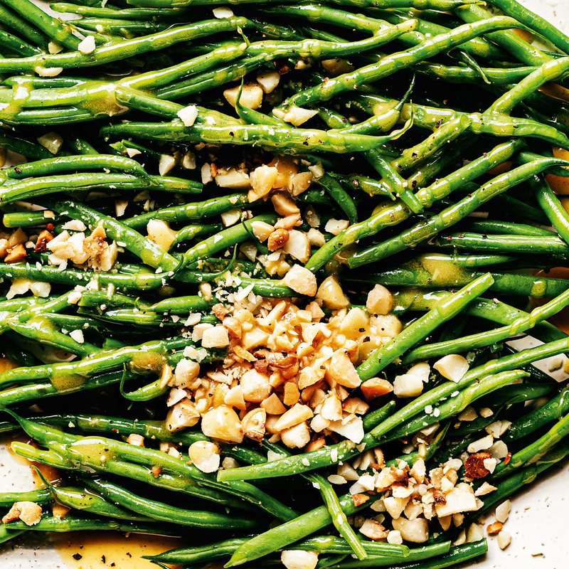 Green beans with honey butter and macadamias