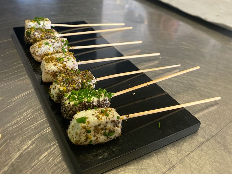 The making of butter | We garnished the butter with fresh aromatics | The making of Livarot cubes | Cream-coated salmon skewers | Sage-infused cream | Fresh cheese quenelle