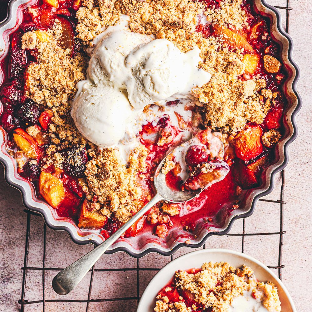 Baked stone fruit with amaretti crumble