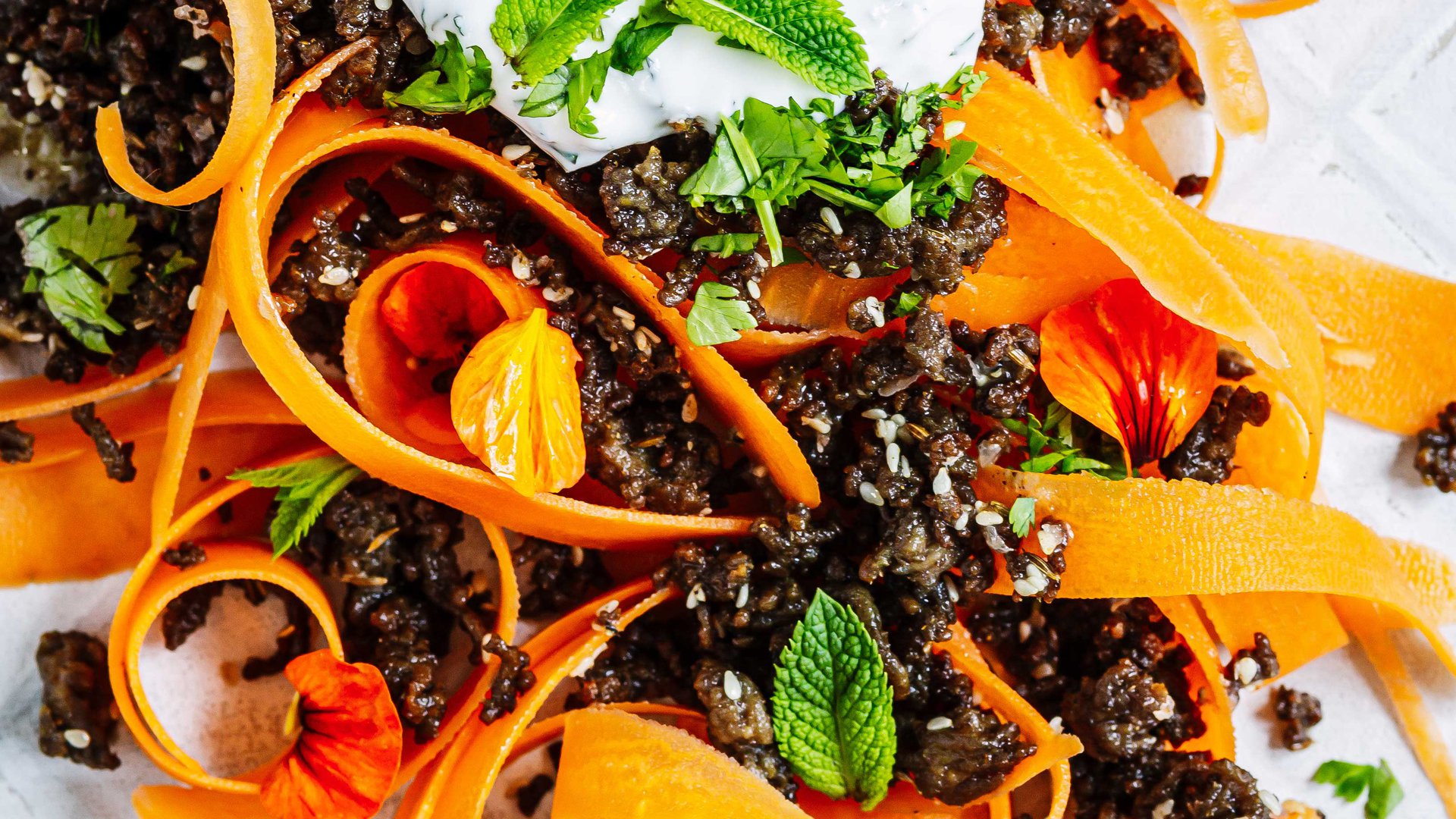 Indian-style carrot salad with mint yoghurt
