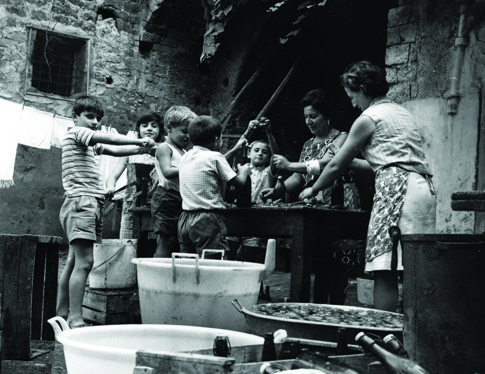 Preparing tomatoes for preservation has been a family ritual handed down through the generations
