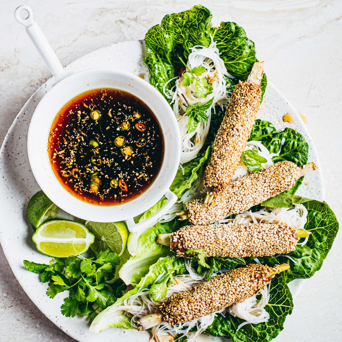 Lemongrass chicken and prawn skewers and vermicelli noodle lettuce wraps