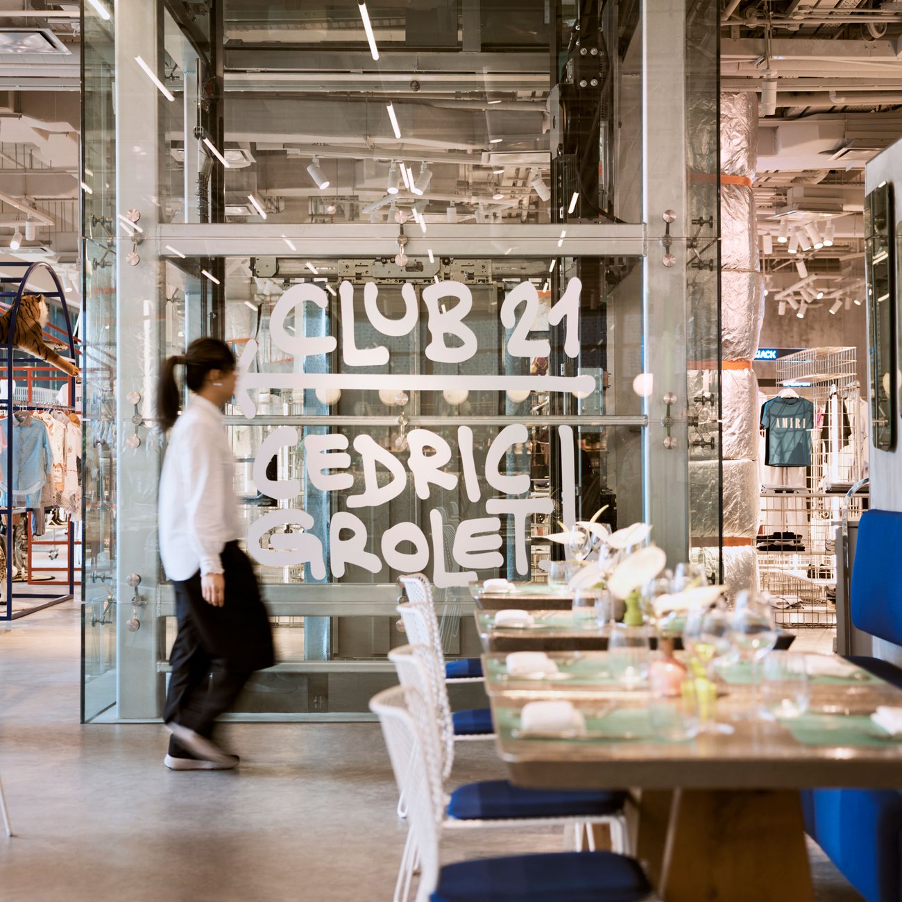 A sleek glass elevator connects Club 21 and chef Cédric Grolet’s space with modern elegance