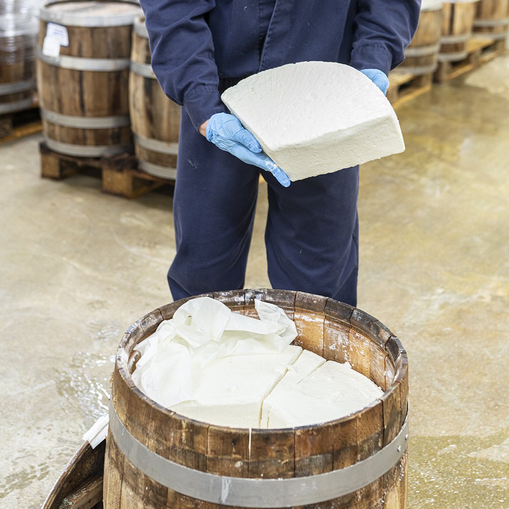 The Roussas family age their feta in beechwood barrels