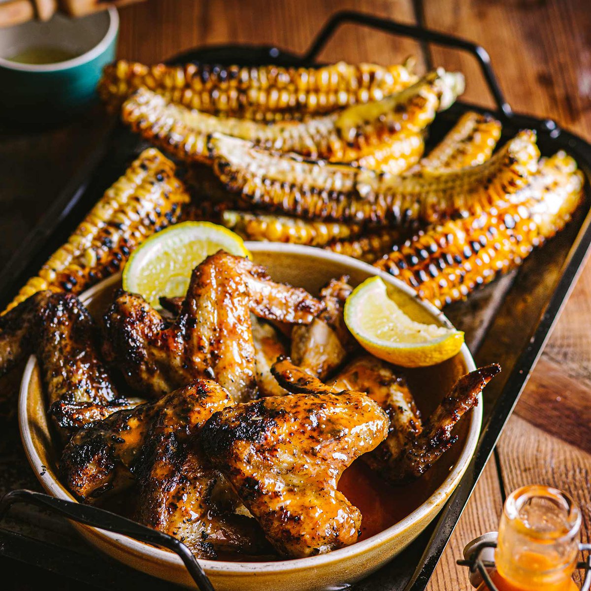 Peri peri chicken with corn riblets and lime