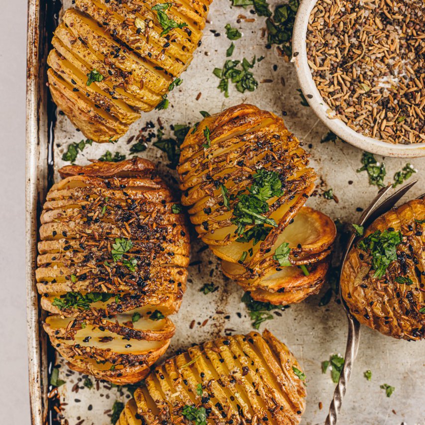 Pilau-spiced hasselback potatoes 