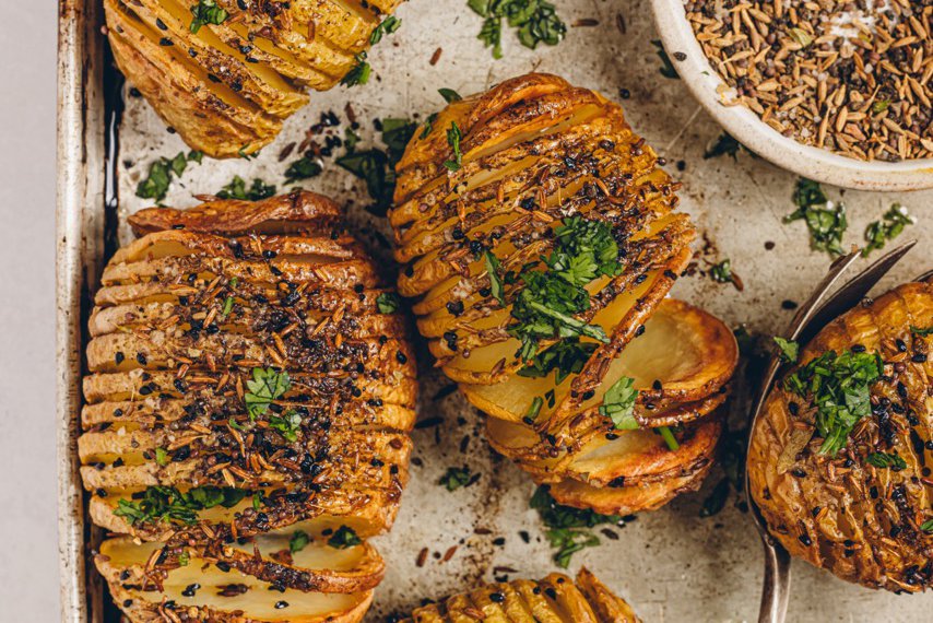 Pilau-spiced hasselback potatoes recipe - Spinneys UAE