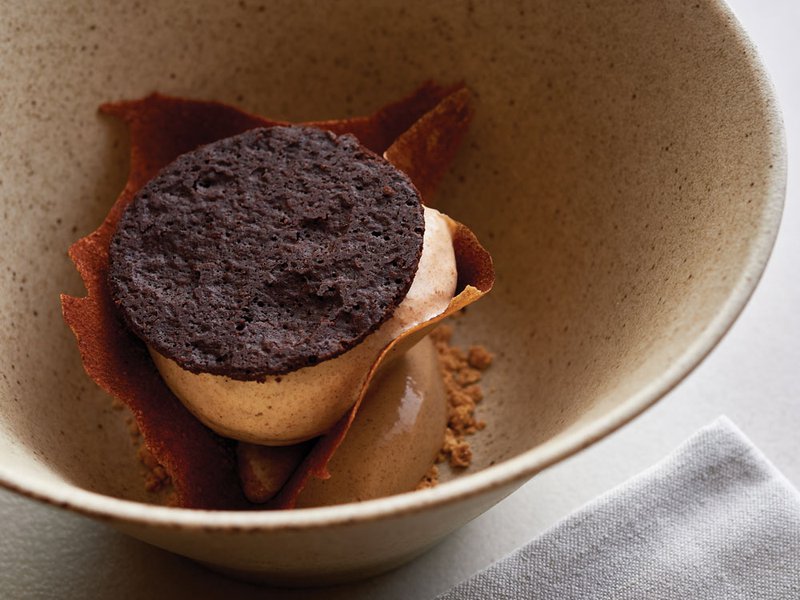 Lowe’s laid-back ambience is per fect for long, lazy meals | Potato ice cream, sesame custard, fromage blanc and miso caramel