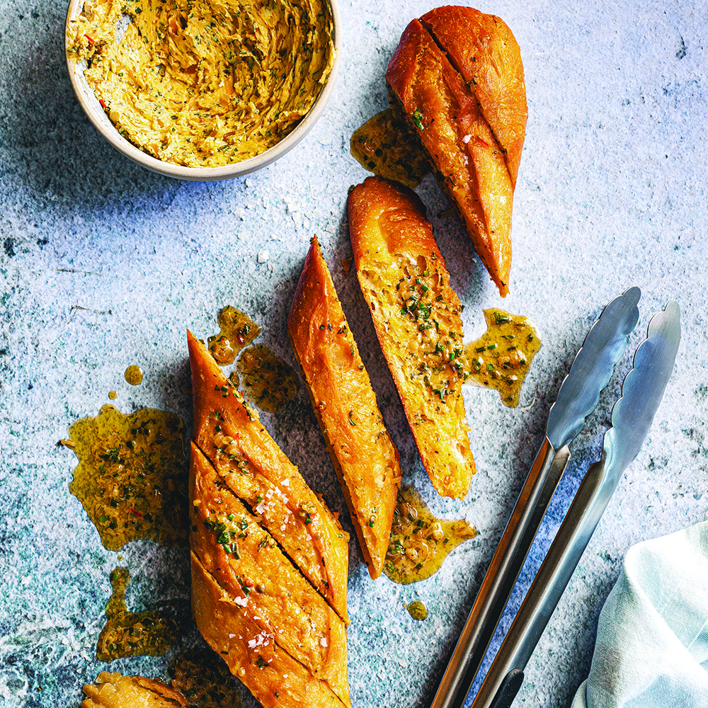 Pull-apart garlic baguette with café de Paris butter