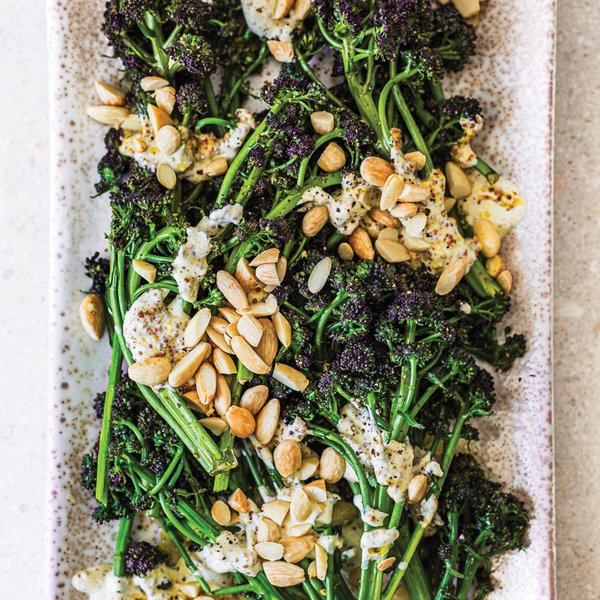 Purple sprouting broccoli with mustard labneh and toasted almonds