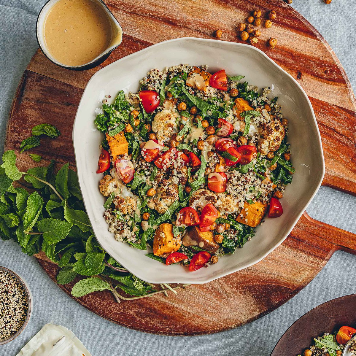 Quinoa harvest salad with miso tahini dressing
