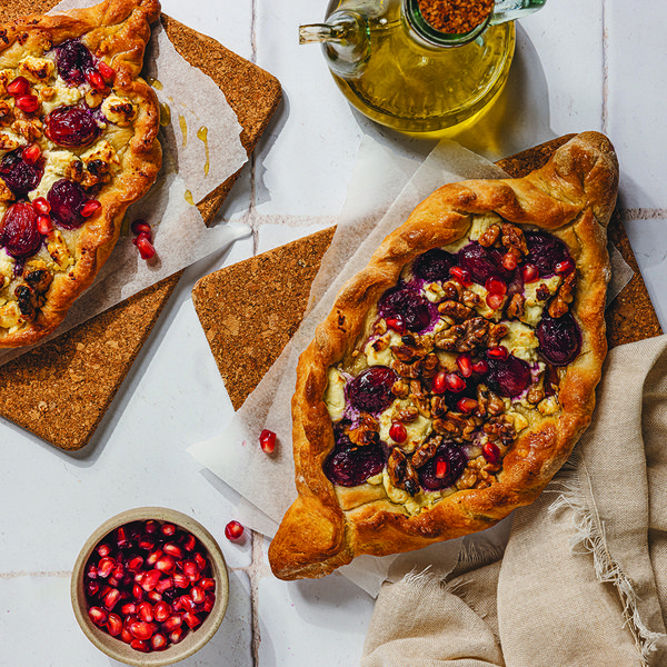 Red grape and walnut pide with goat’s cheese
