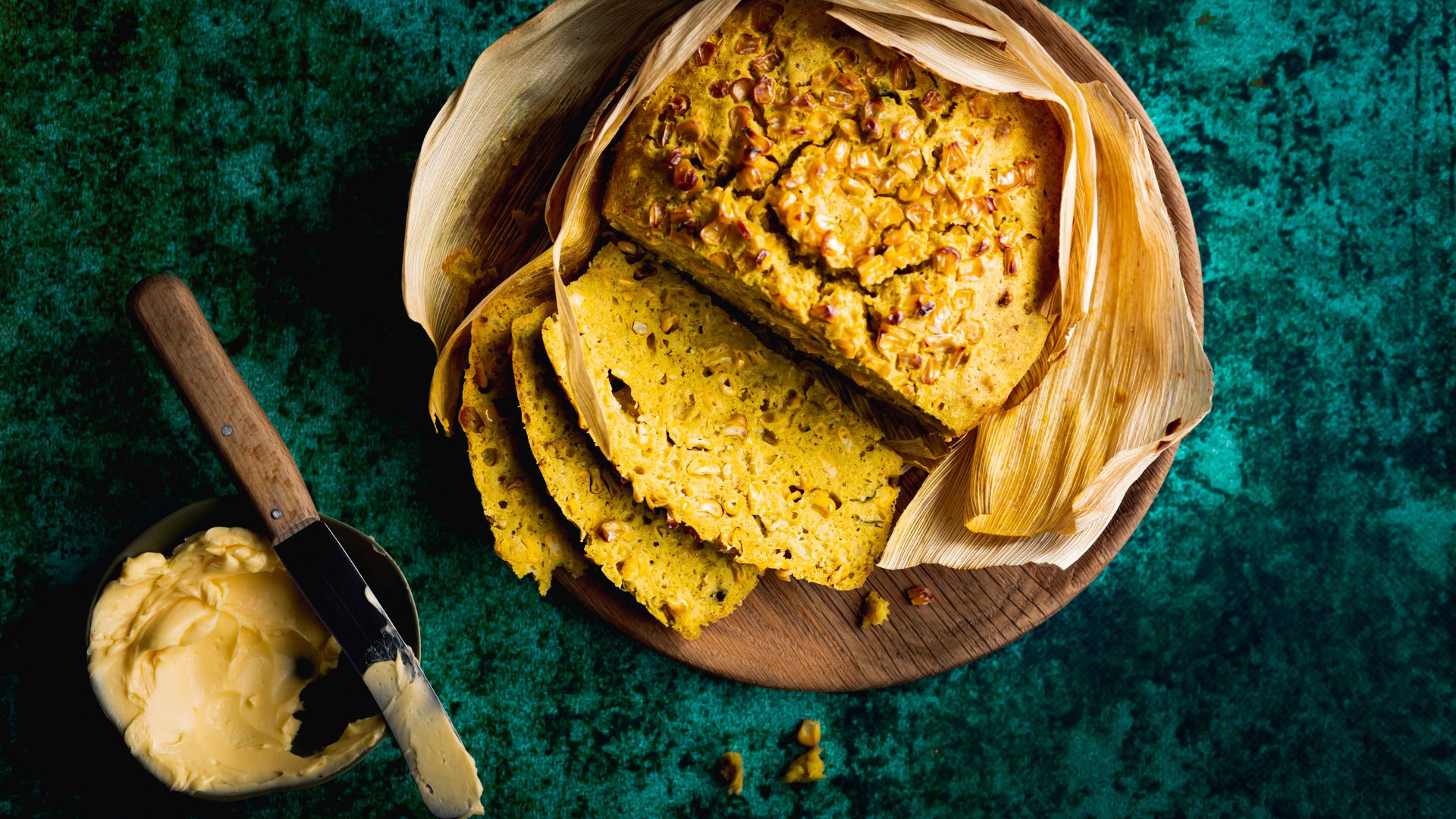 Spicy grilled corn bread wrapped in corn husks