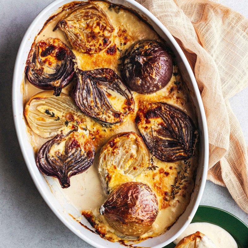 Stuffed onions baked in Parmesan cream