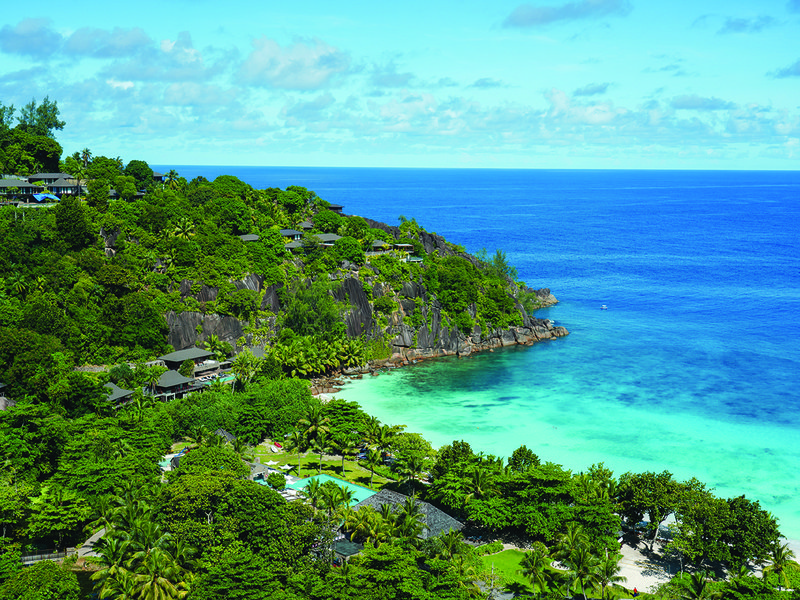 A Creole cooking class teaches guests to make a traditional garden curry and fish steaks  │ The waters of Petite Anse Bay offer excellent swimming and snorkelling  │ Grilled seafood platter at Kannel restaurant