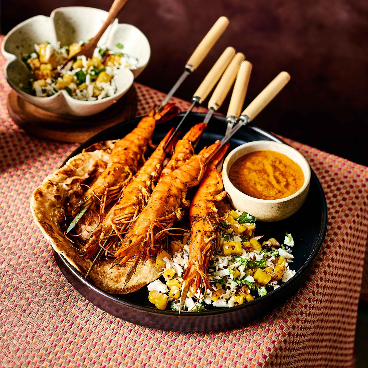 BBQ tikka masala prawns with charred corn and lime sambal