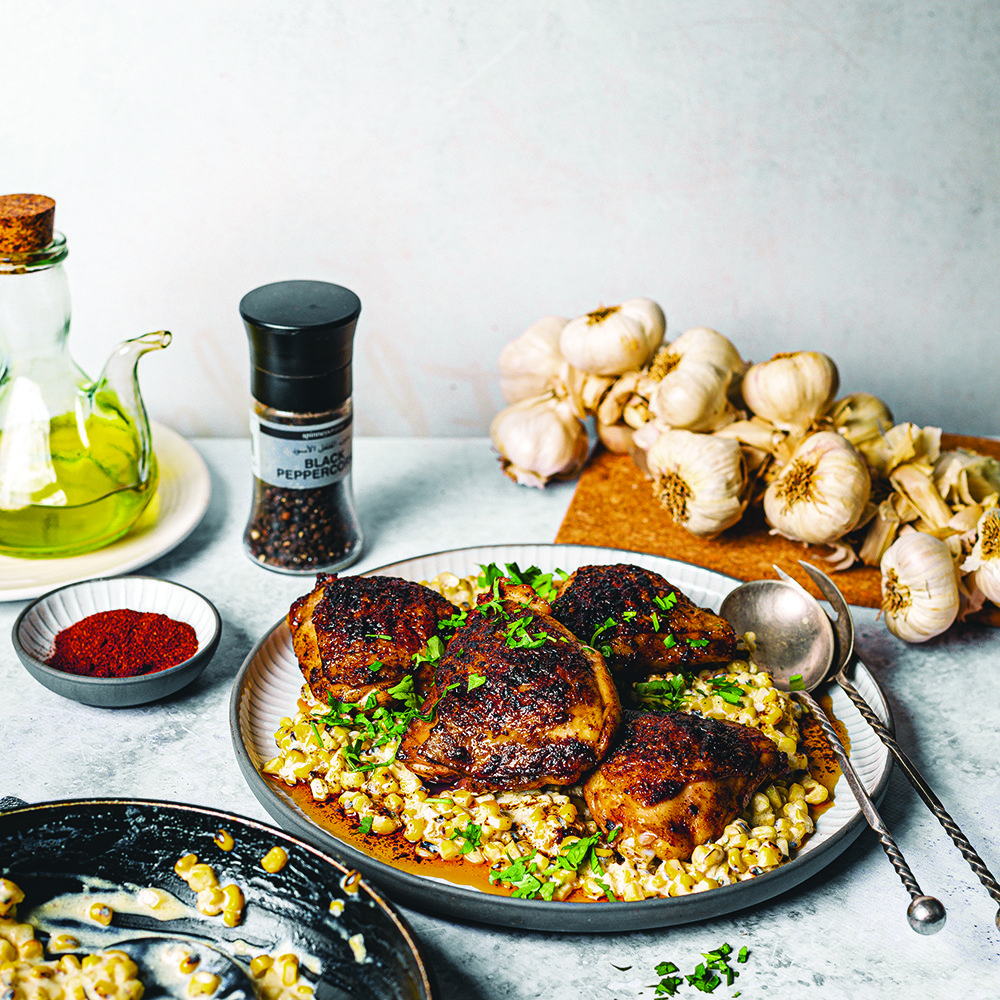 Smoked paprika chicken thighs with charred cream corn recipe - Spinneys UAE