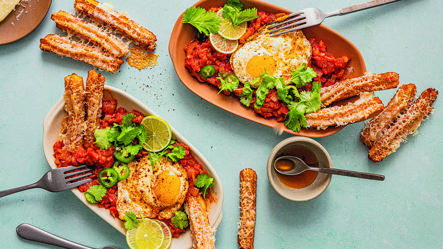 Spanish-style eggs with cheesy churros