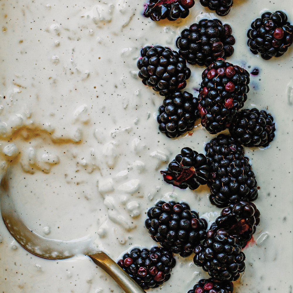 White chocolate and cardamom kheer with blackberries