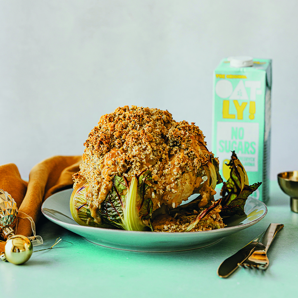 Baked whole cauliflower cheese