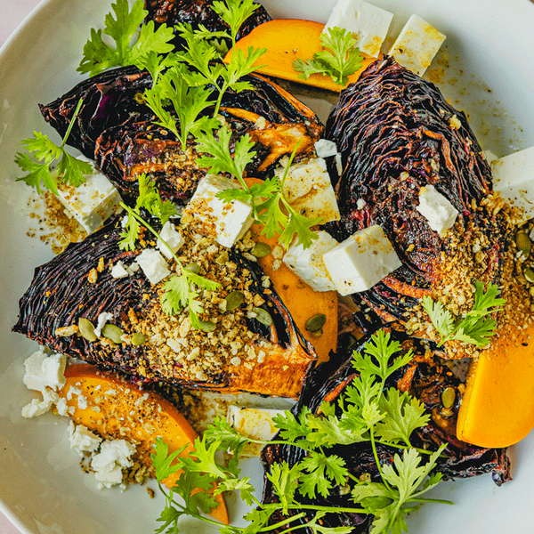 Cabbage, mango and pumpkin seed salad with goat’s cheese and crispy za’atar panko topping