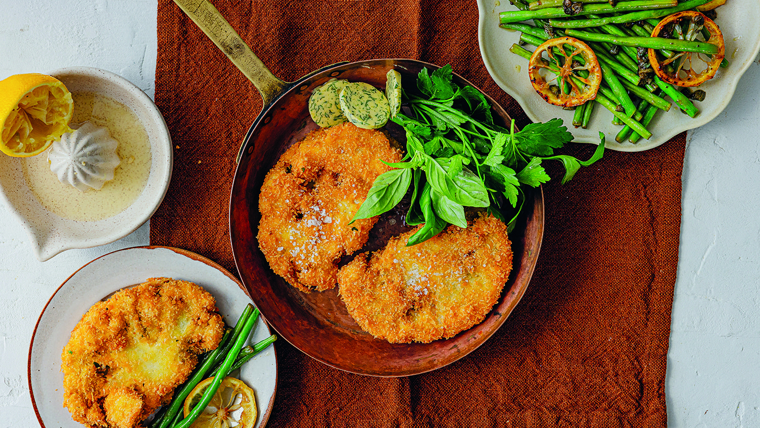 Cauliflower Kiev schnitzels with warm lemon and caper green beans