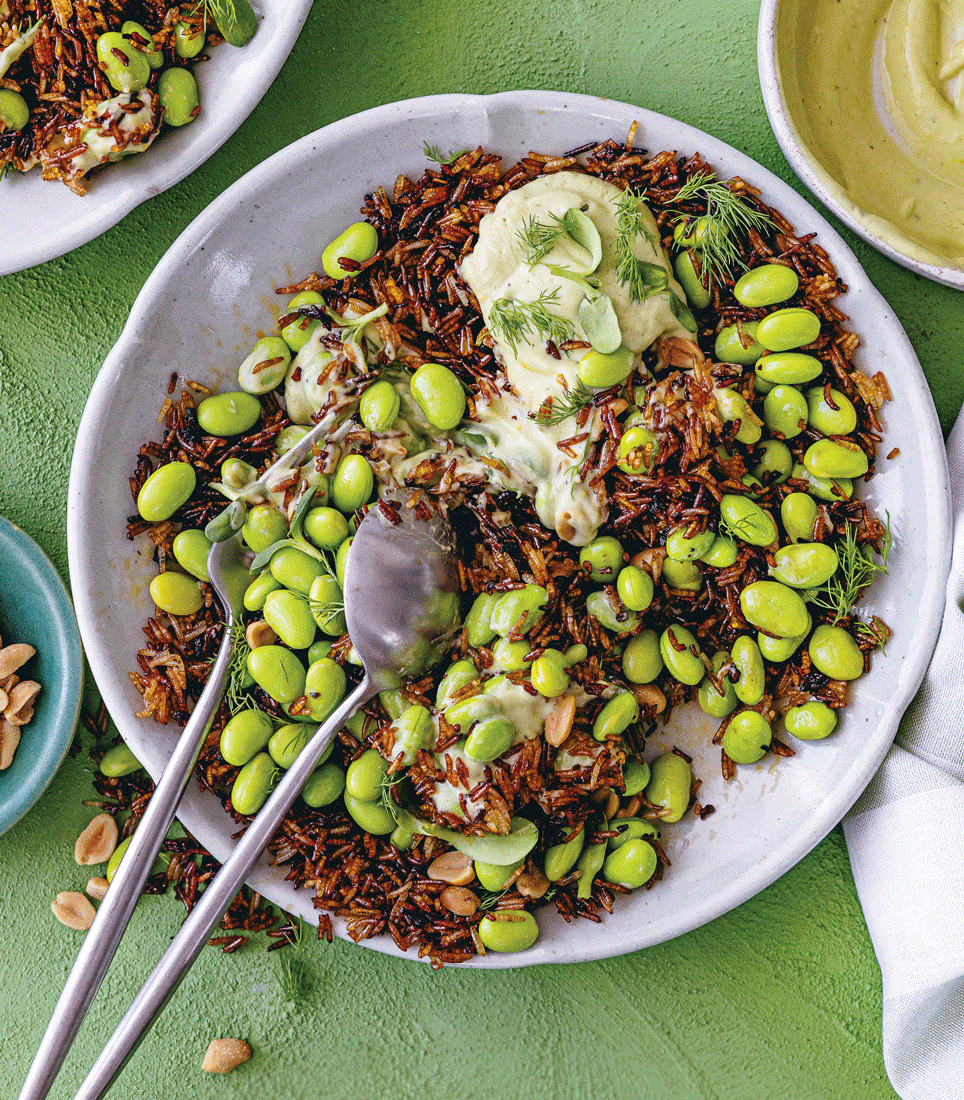 Crispy rice salad with edamame, peanuts and avocado-tahini drizzle