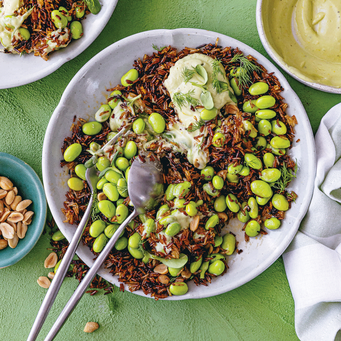Crispy rice salad with edamame, peanuts and avocado-tahini drizzle