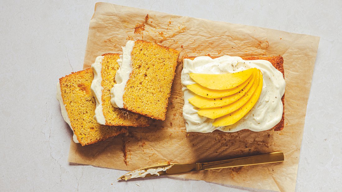 Mango and black pepper ghee cake with cardamom icing