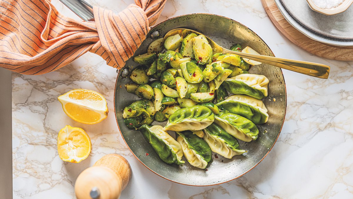Potato, pecorino and mint culurgiones with Brussels sprouts