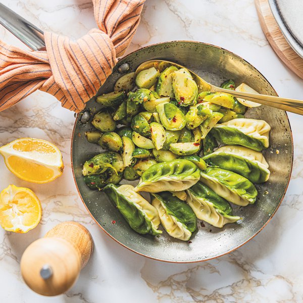 Potato, pecorino and mint culurgiones with Brussels sprouts