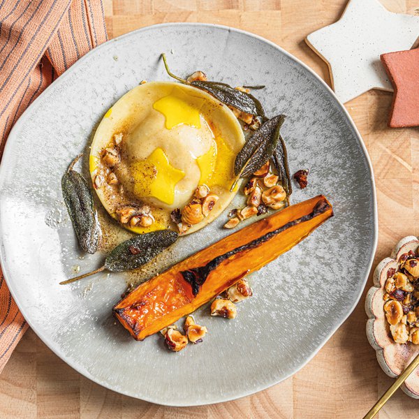 Pumpkin and hazelnut star ravioli with maple butter sauce