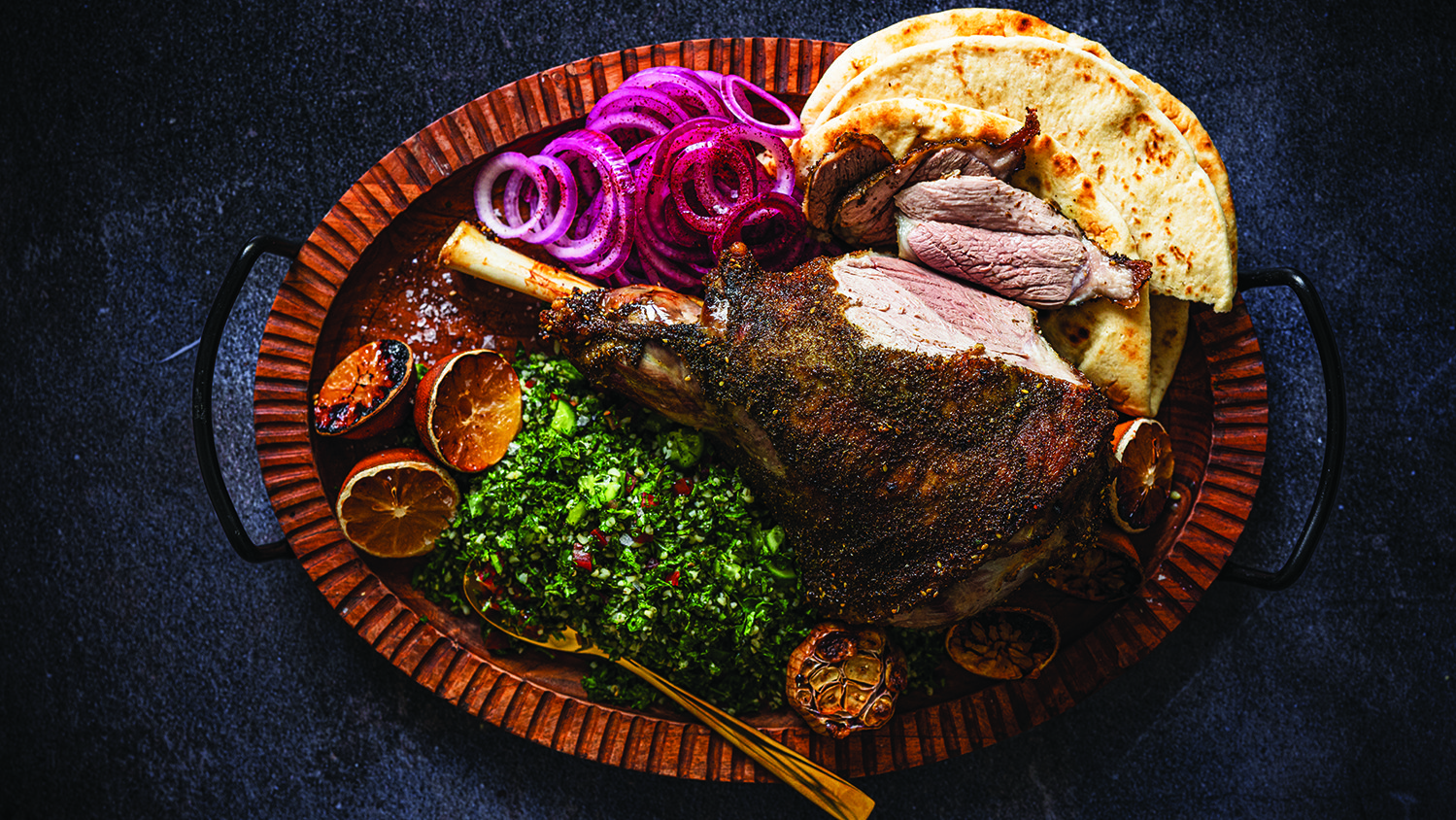 Za’atar rubbed Welsh lamb leg with roasted lemons