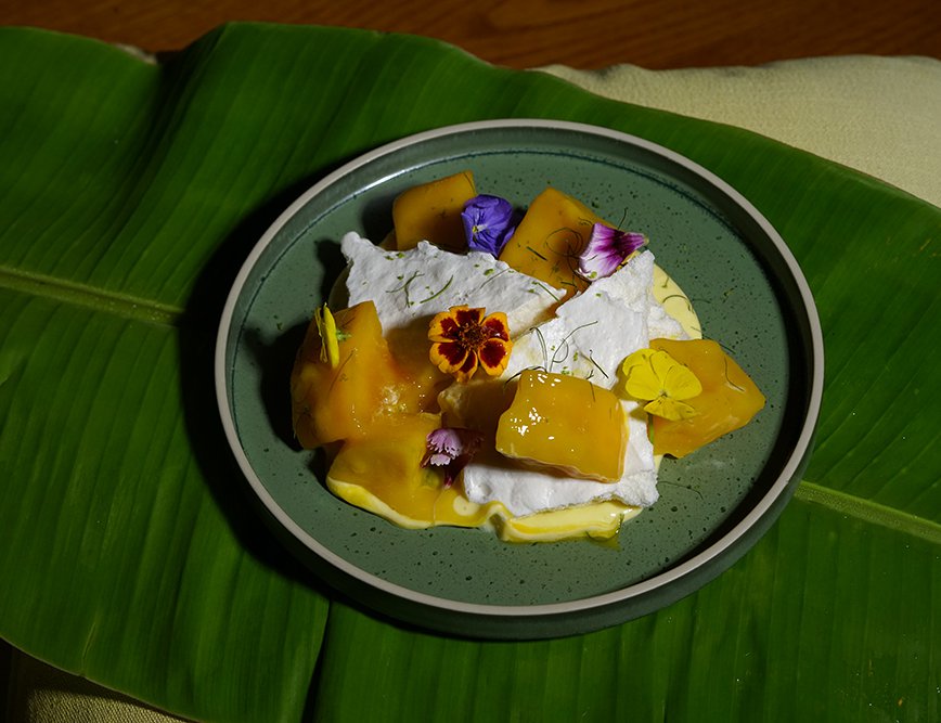 Harummanis mango curd with keffir lime, meringue and edible flowers