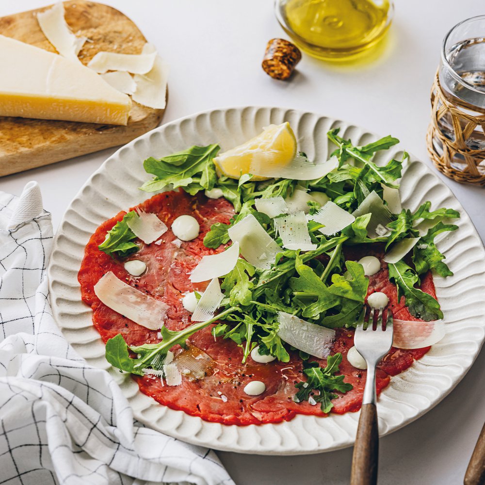 Beef carpaccio with Parmigiano Reggiano and smoky aioli