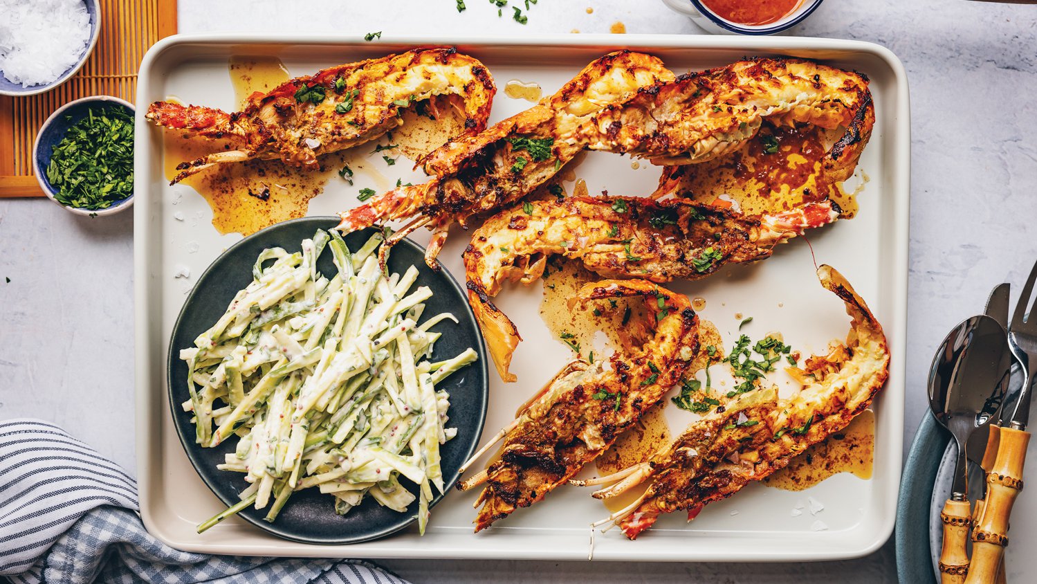 Braaied garlic-butter crayfish with baby marrow slaw