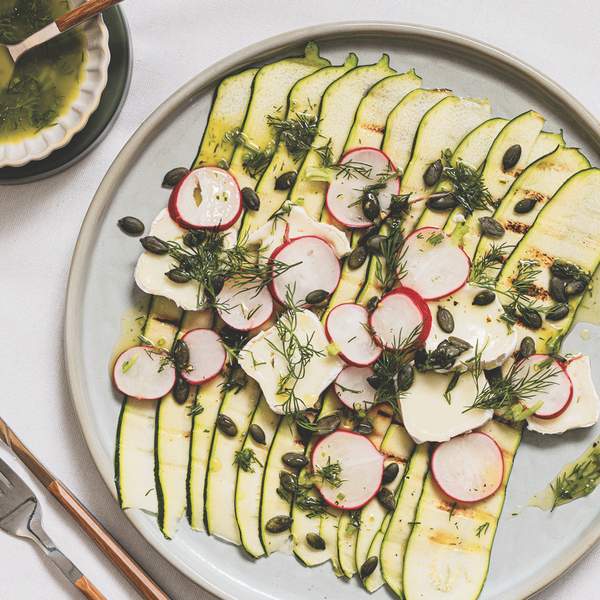 Grilled courgette ribbons with pickled radish, goat’s cheese and dill