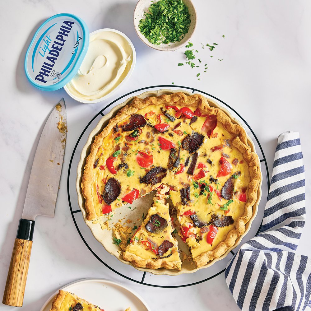 Creamy biltong, caramelised onion and peppadew quiche